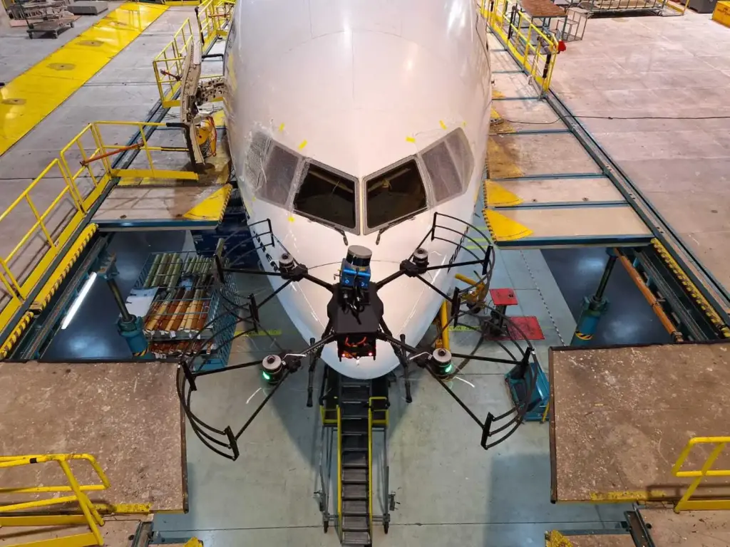 A Boeing 777-300ER aircraft is being inspected by one of Near Earth Autonomy’s drones Feb. 2, 2024, at an Emirates Airlines facility in Dubai, United Arab Emirates.